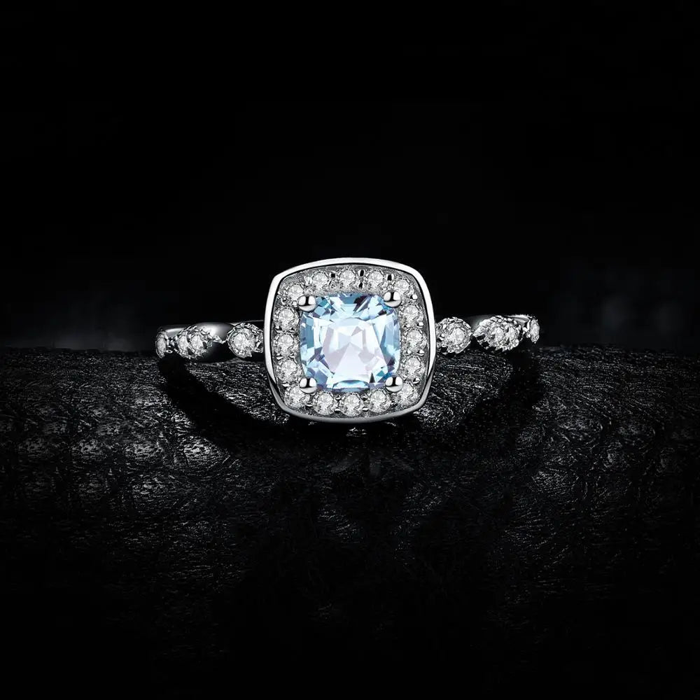 AVERLLA™ Blue Topaz Halo Engagement Ring